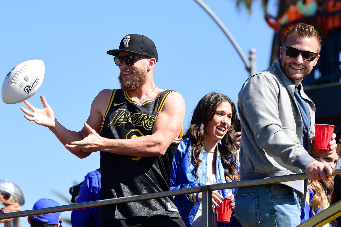 Feb 16, 2022; Los Angeles, CA, USA; Los Angeles Rams wide receiver Cooper Kupp and head coach Sean McVay celebrate during the championship victory parade. Mandatory Credit: Gary A. Vasquez-USA TODAY Sports