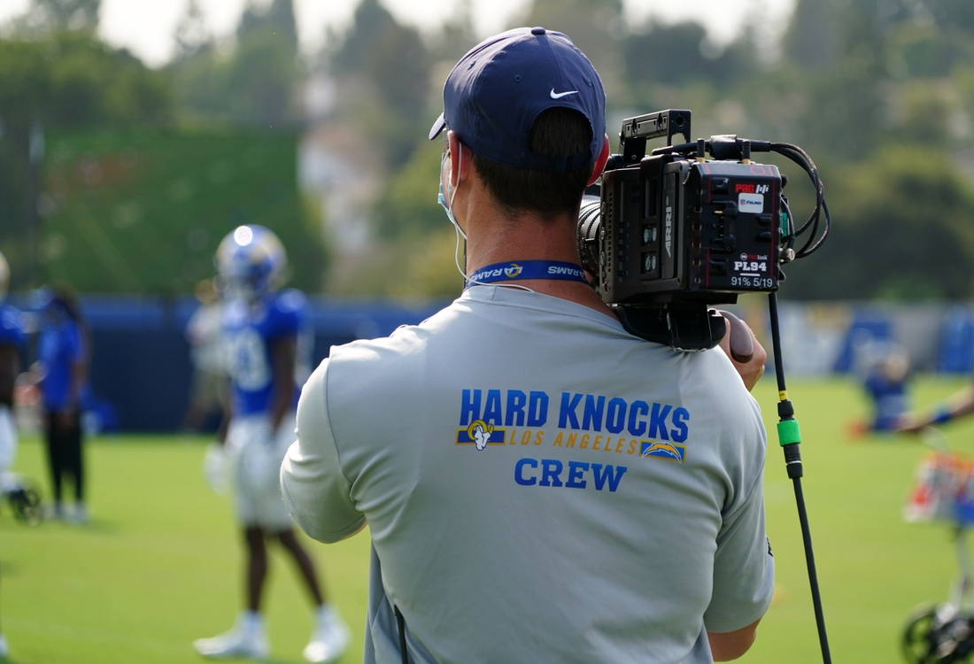 Aug 18, 2020; Thousand Oaks California, USA; An HBO Hard Knocks film cameraman shoots video footage at Los Angeles Rams training camp at Cal Lutheran University. Mandatory Credit: Kirby Lee-USA TODAY Sports