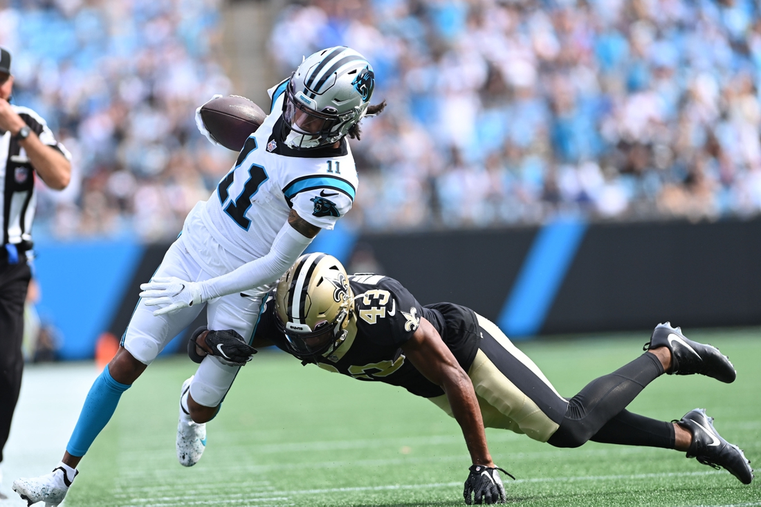 Sep 19, 2021; Charlotte, North Carolina, USA;  Carolina Panthers wide receiver Robby Anderson (11) with the ball as New Orleans Saints free safety Marcus Williams (43) defends in the fourth quarter at Bank of America Stadium. Mandatory Credit: Bob Donnan-USA TODAY Sports