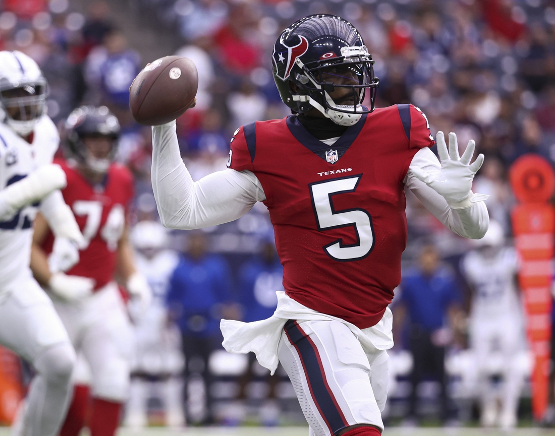 Dec 5, 2021; Houston, Texas, USA; Houston Texans quarterback Tyrod Taylor (5) attempts a pass during the first quarter against the Indianapolis Colts at NRG Stadium. Mandatory Credit: Troy Taormina-USA TODAY Sports