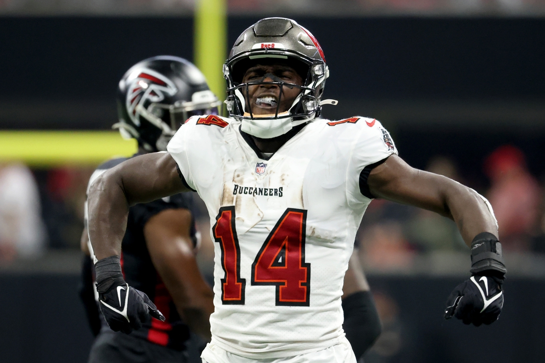 Dec 5, 2021; Atlanta, Georgia, USA; Tampa Bay Buccaneers wide receiver Chris Godwin (14) reacts after making a catch during the fist quarter against the Atlanta Falcons at Mercedes-Benz Stadium. Mandatory Credit: Jason Getz-USA TODAY Sports