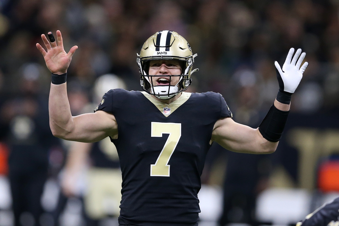 Jan 2, 2022; New Orleans, Louisiana, USA; New Orleans Saints quarterback Taysom Hill (7) gestures as he calls a play in the first quarter against the Carolina Panthers at the Caesars Superdome. Mandatory Credit: Chuck Cook-USA TODAY Sports