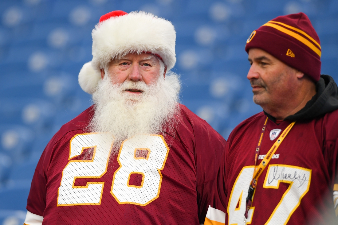 Nov 3, 2019; Orchard Park, NY, USA; A Washington Redskins fan wearing a Santa Claus hat looks on prior to the game against the Buffalo Bills at New Era Field. Mandatory Credit: Rich Barnes-USA TODAY Sports