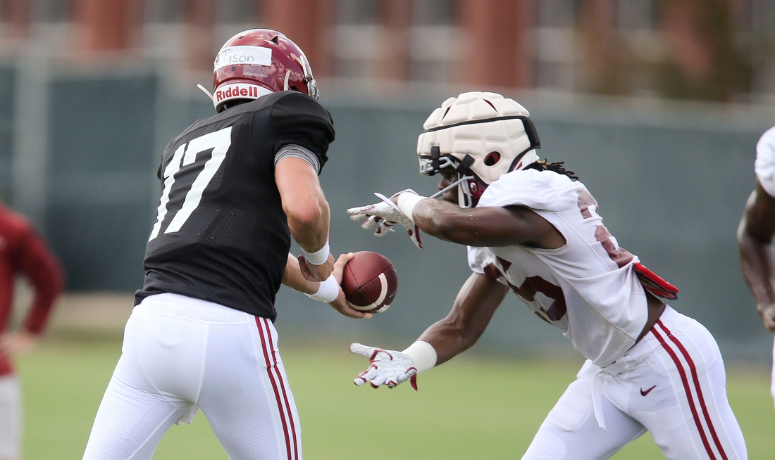 Quarterback Paul Tyson (17) hands off to running back Camar Wheaton (25) during practice for the Crimson Tide Thursday, Aug. 12, 2021.[Staff Photo/Gary Cosby Jr.]

Alabama Practice August 12