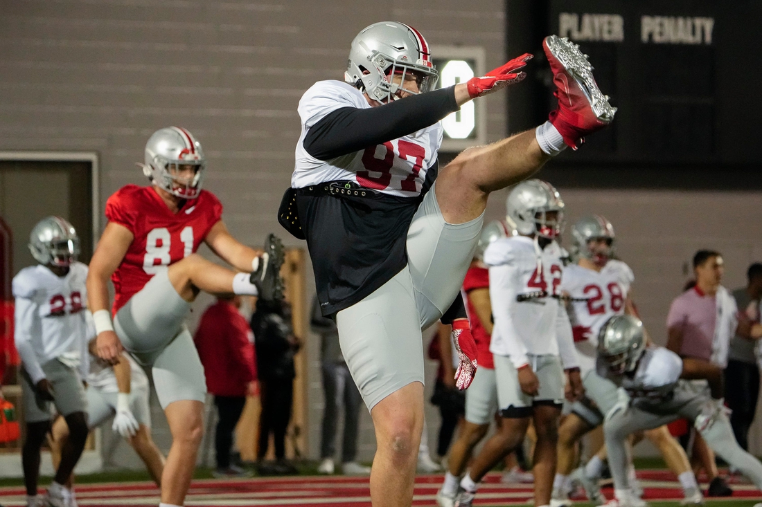 Ohio State Buckeyes defensive lineman Noah Potter (97) stretches during a spring football practice at the Woody Hayes Athletics Center in Columbus on March 22, 2022.

Ncaa Football Ohio State Spring Practice