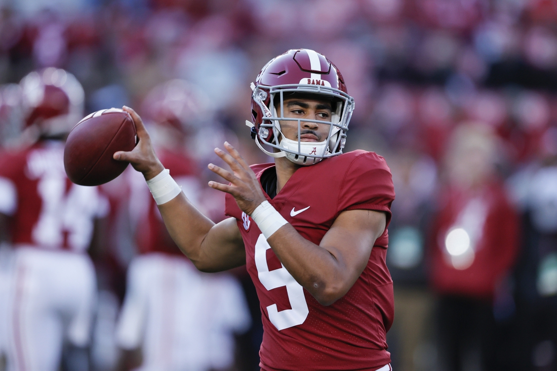 Nov 6, 2021; Tuscaloosa, Alabama, USA; Alabama Crimson Tide quarterback Bryce Young (9) warms up before the start against the LSU Tigers at Bryant-Denny Stadium. Mandatory Credit: Butch Dill-USA TODAY Sports