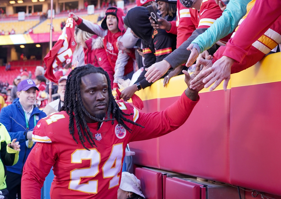 Dec 12, 2021; Kansas City, Missouri, USA; Kansas City Chiefs defensive end Melvin Ingram (24) greets fans while leaving the field after the win over the Las Vegas Raiders at GEHA Field at Arrowhead Stadium. Mandatory Credit: Denny Medley-USA TODAY Sports