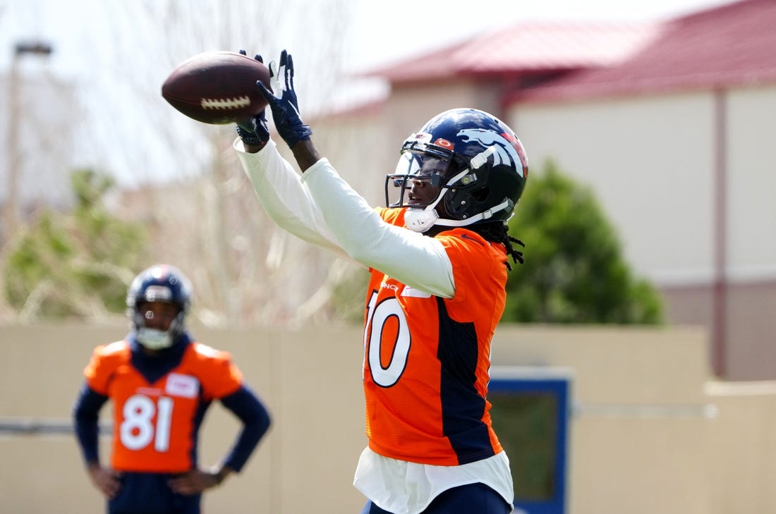 Apr 25, 2022; Englewood, CO, USA; Denver Broncos wide receiver Jerry Jeudy (10) works out during a Denver Broncos mini camp at UCHealth Training Center. Mandatory Credit: Ron Chenoy-USA TODAY Sports