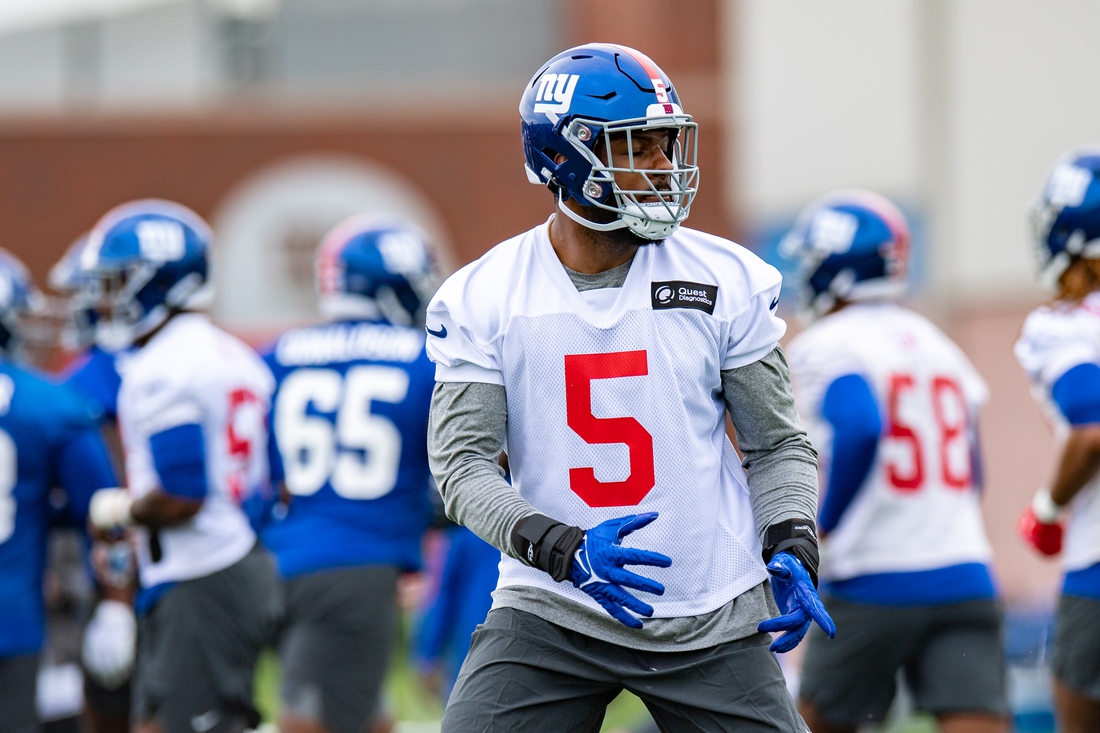 May 13, 2022; East Rutherford, NJ, USA; New York Giants linebacker Kayvon Thibodeaux (5) practices a drill during rookie camp at Quest Diagnostics Training Center. Mandatory Credit: John Jones-USA TODAY Sports