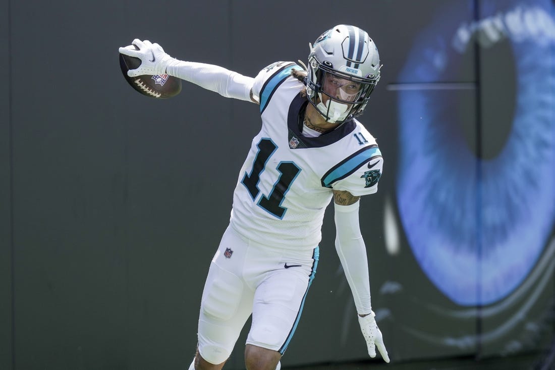 Sep 12, 2021; Charlotte, North Carolina, USA; Carolina Panthers wide receiver Robby Anderson (11) celebrates his touchdown reception from quarterback Sam Darnold (not pictured) against the New York Jets during the second quarter at Bank of America Stadium. Mandatory Credit: Jim Dedmon-USA TODAY Sports