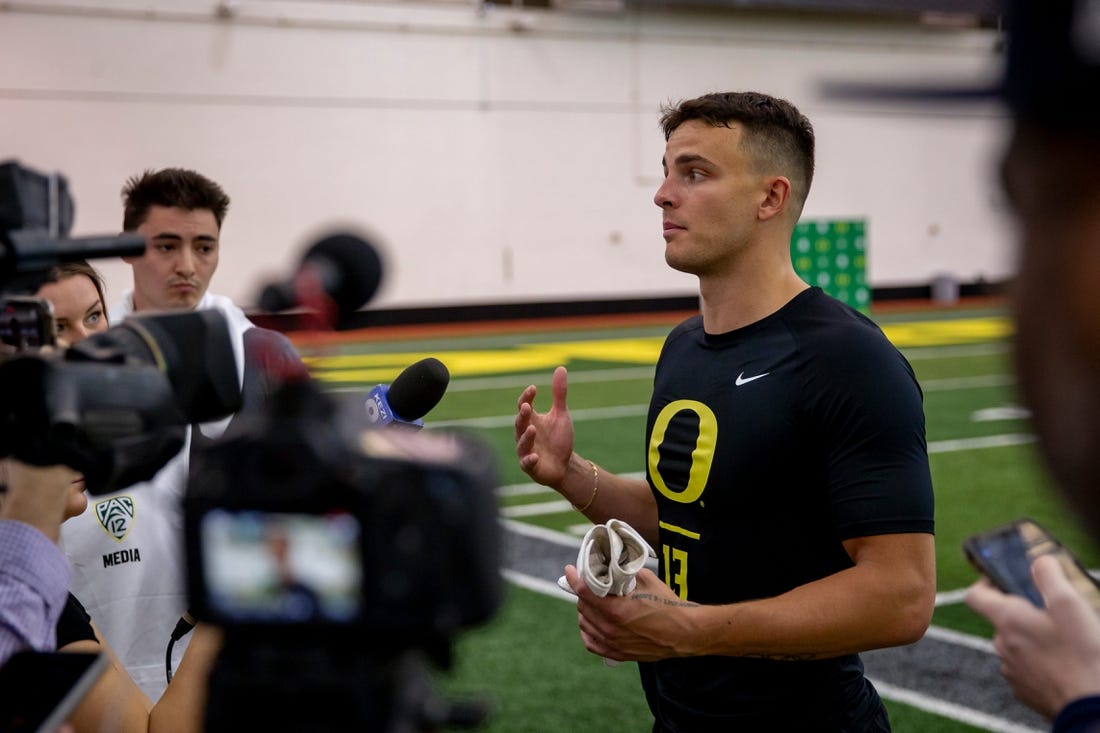 Devon Allen talks to reporters during Oregon Football   s Pro Day Friday, April 1, 2022, at the Moshofsky Center in Eugene Ore.
