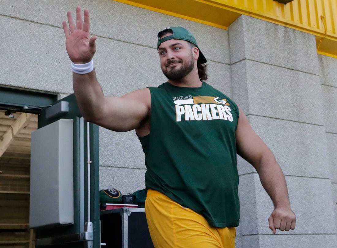 Green Bay Packers offensive tackle David Bakhtiari waves to the cameras at the start of minicamp practice Tuesday, June 8, 2021, in Green Bay, Wis. Dan Powers/USA TODAY NETWORK-Wisconsin

Apc Packersminicamp 0608211199djp