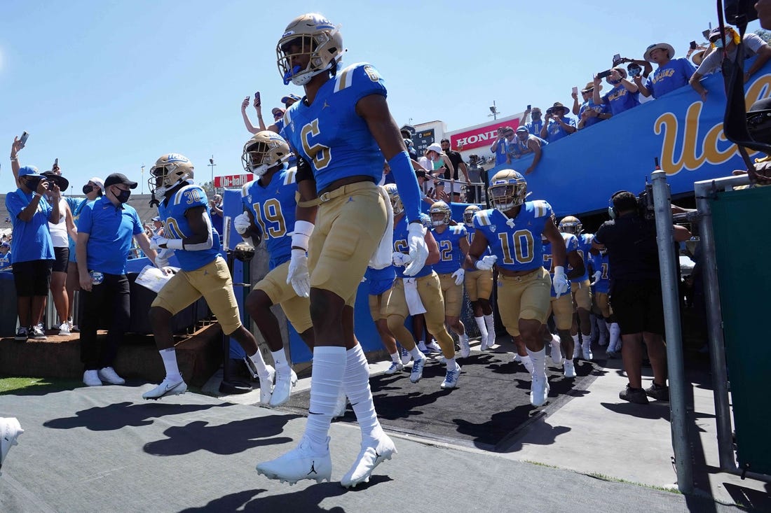Aug 28, 2021; Pasadena, California, USA; A general overall view as UCLA Bruins enter the field before the game against the Hawaii Rainbow Warriors at Rose Bowl. Mandatory Credit: Kirby Lee-USA TODAY Sports