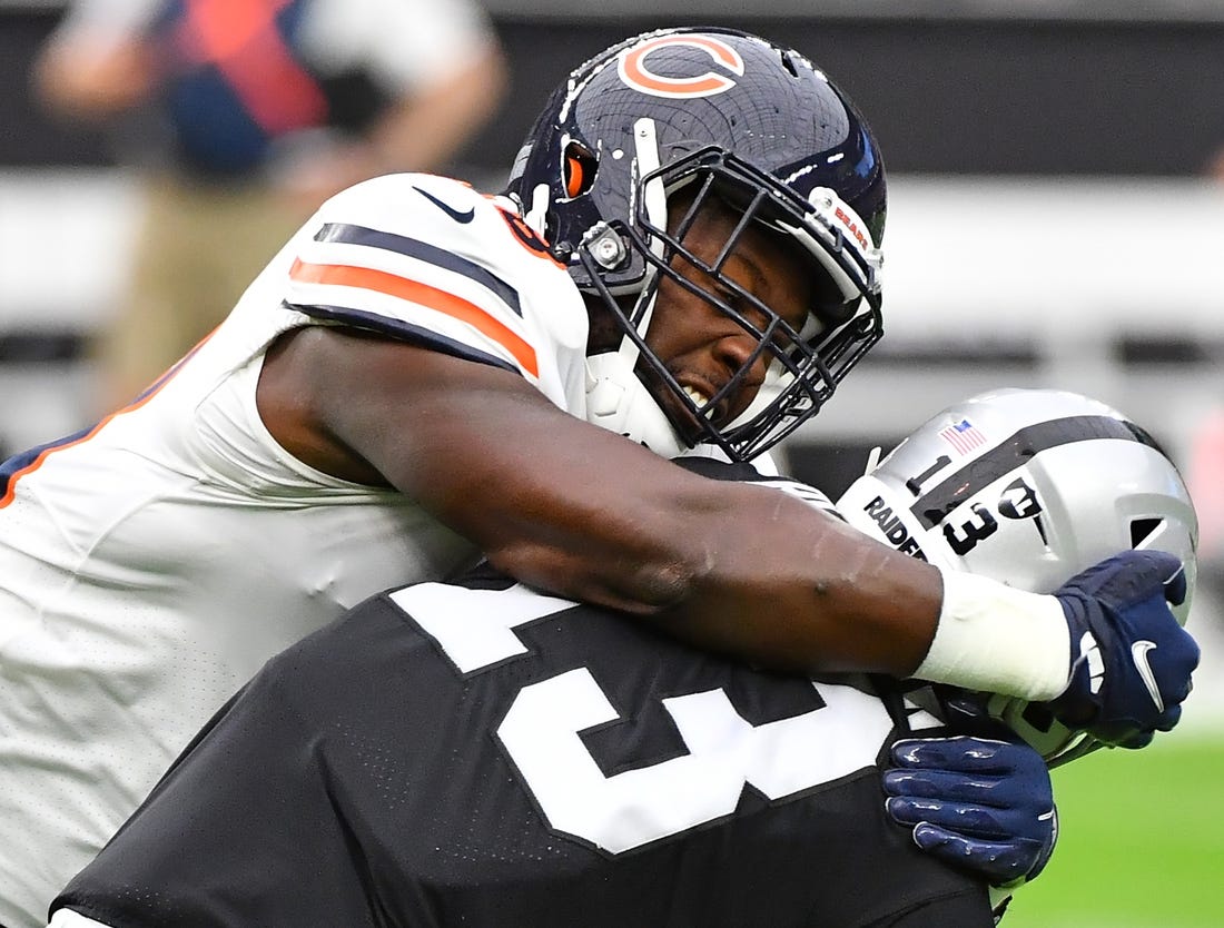 Oct 10, 2021; Paradise, Nevada, USA; Chicago Bears inside linebacker Roquan Smith (58) tackles Las Vegas Raiders wide receiver Hunter Renfrow (13) during a game at Allegiant Stadium. Mandatory Credit: Stephen R. Sylvanie-USA TODAY Sports