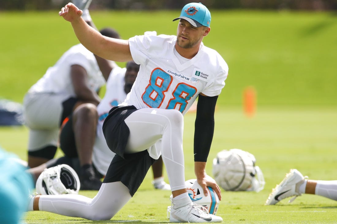 Jun 2, 2022; Miami Gardens, Florida, USA; Miami Dolphins tight end Mike Gesicki (88) works out during minicamp at Baptist Health Training Complex. Mandatory Credit: Sam Navarro-USA TODAY Sports