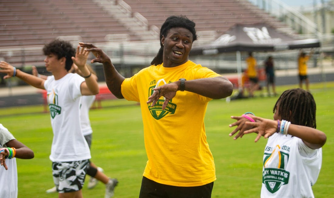 Sammy Watkins, a professional football player for the Green Bay Packers and graduate of South Fort Myers High School participates in a youth football camp that bears his name at South Fort Myers High School on Thursday, July 14, 2022.

Sammyv0414