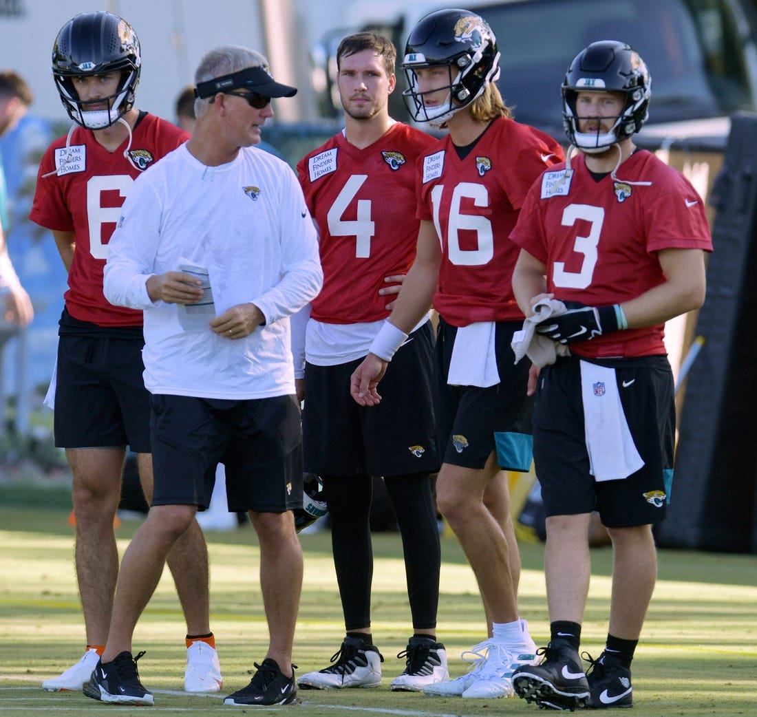 Quarterbacks coach Mike McCoy talks with Jacksonville Jaguars quarterbacks Jake Luton (6), Kyle Sloter (4) , Trevor Lawrence (16) and  C.J. Beathard (3) during drills at Monday morning's training camp session. The Jacksonville Jaguars held their first day of training camp Monday, July 25, 2022 at the Episcopal High School Knight Campus practice fields on Atlantic Blvd.

Jki 072522 Jaguarsmondaytrainingcamp 04