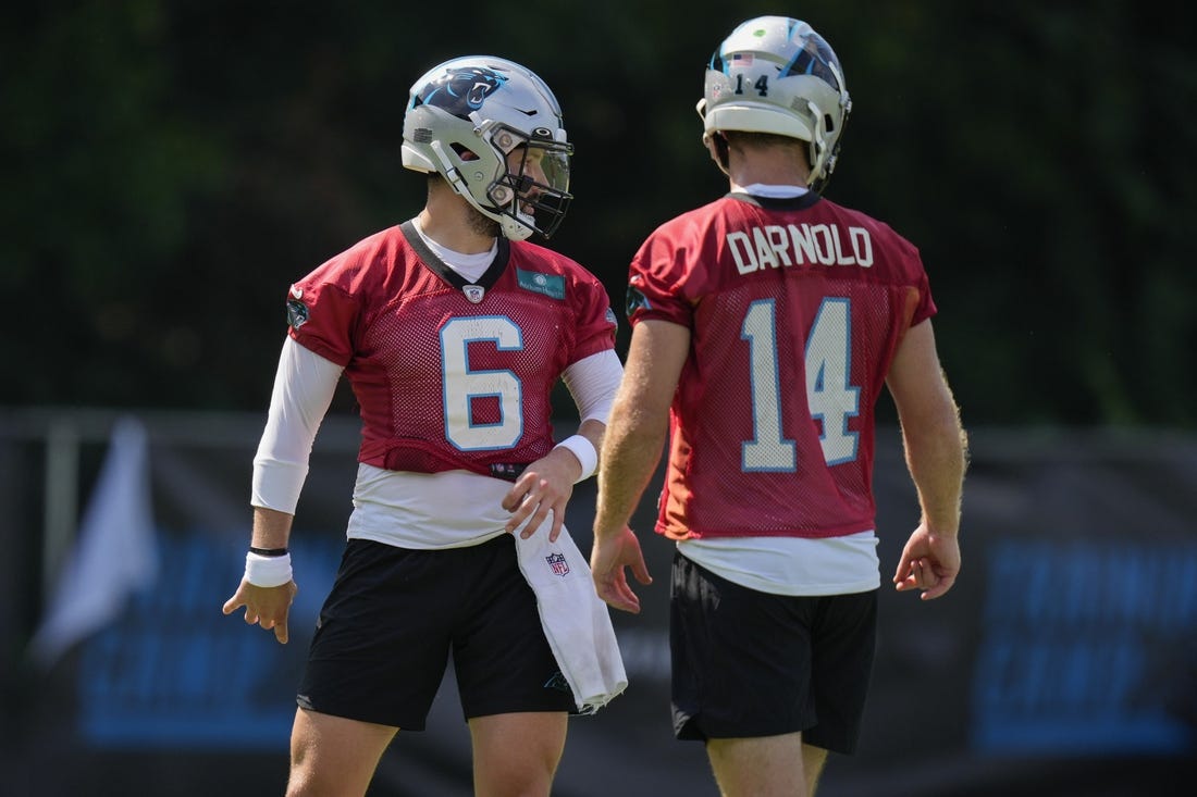 Jul 28, 2022; Spartanburg, SC, USA; Carolina Panthers quarterback Baker Mayfield (6) and quarterback Sam Darnold (14) during the third day of training camp at Wofford College. Mandatory Credit: Jim Dedmon-USA TODAY Sports