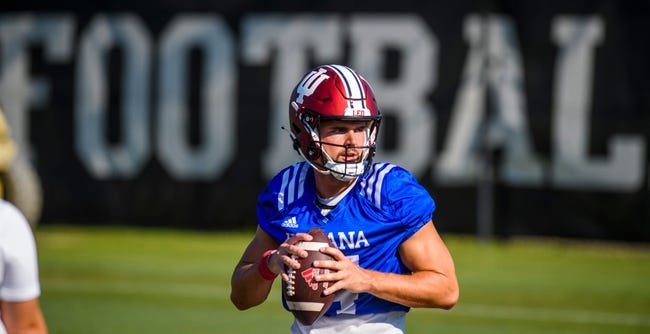 Indiana's Jack Tuttle (14) prepares to throw a pass during fall football camp at Indiana University on Thursday, Aug. 11, 2022.

Iufb Qb Jack Tuttle 1