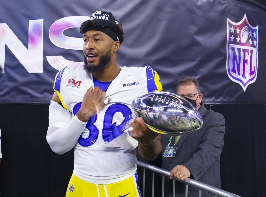 Feb 13, 2022; Inglewood, CA, USA; Los Angeles Rams tight end Kendall Blanton celebrates with the Vince Lombardi Trophy after defeating the Cincinnati Bengals during Super Bowl LVI at SoFi Stadium. Mandatory Credit: Mark J. Rebilas-USA TODAY Sports