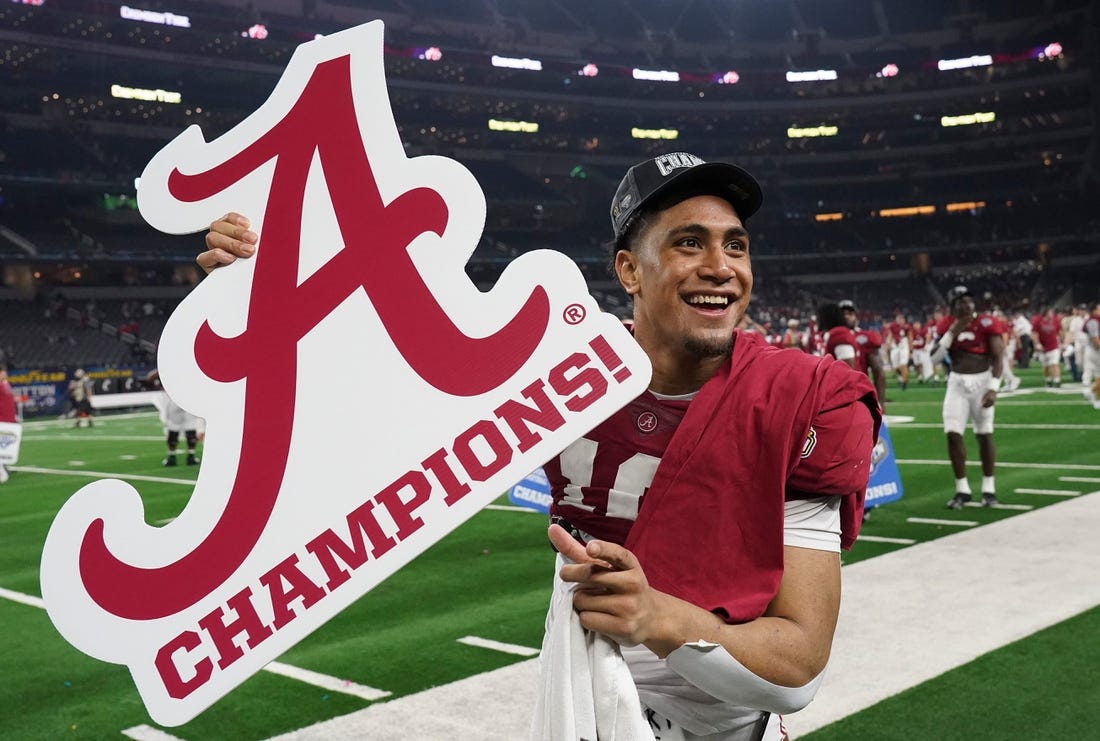 Alabama linebacker Henry To'o To'o (10) enjoys the victory after the 2021 College Football Playoff Semifinal game at the 86th Cotton Bowl in AT&T Stadium in Arlington, Texas Friday, Dec. 31, 2021. Alabama defeated Cincinnati 27-6 to advance to the national championship game. [Staff Photo/Gary Cosby Jr.]College Football Playoffs Alabama Vs Cincinnati