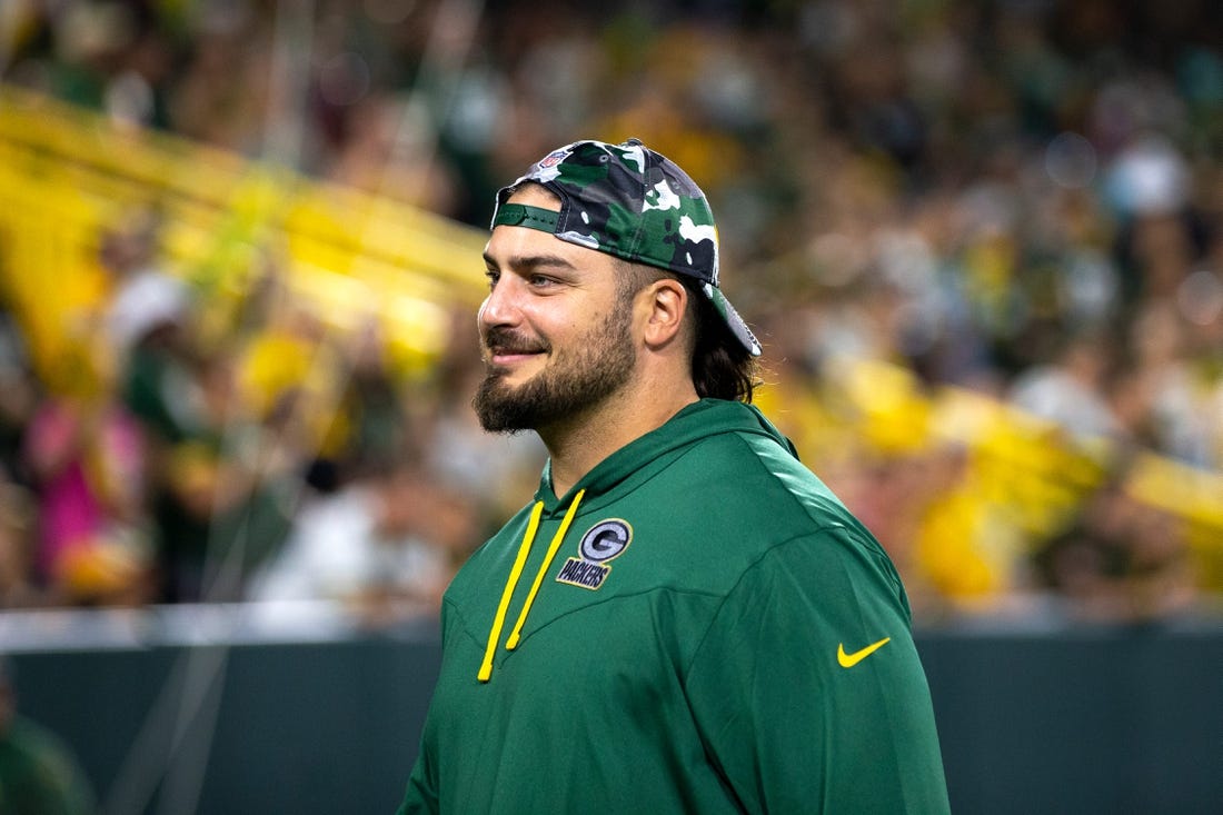 Green Bay Packers tackle David Bakhtiari (69) smiles at fans during Packers Family Night on Friday, Aug. 5, 2022, at Lambeau Field in Green Bay, Wis. Samantha Madar/USA TODAY NETWORK-Wis.

Gpg Family Night 08052022 00034
