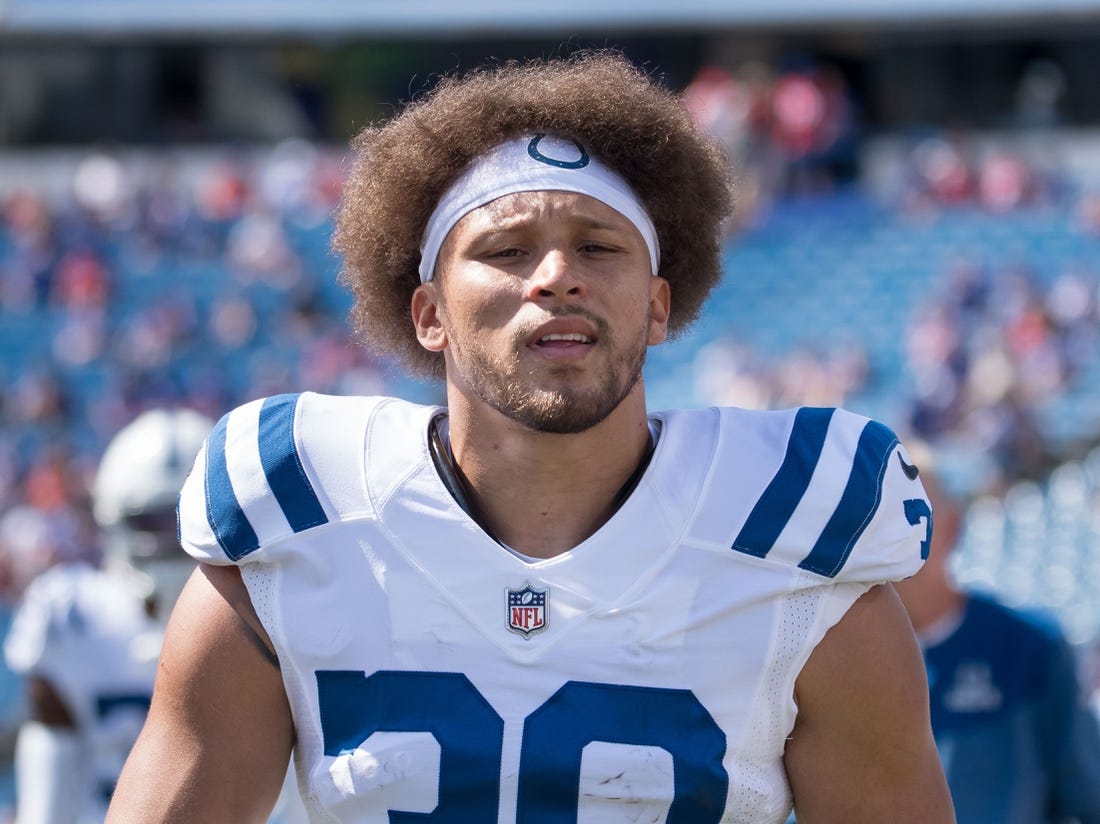 Aug 13, 2022; Orchard Park, New York, USA; Indianapolis Colts running back Phillip Lindsay (30) warms up before a pre-season game against the Buffalo Bills at Highmark Stadium. Mandatory Credit: Mark Konezny-USA TODAY Sports