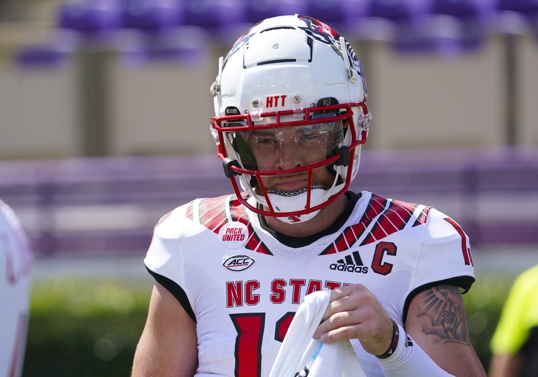 Sep 3, 2022; Greenville, North Carolina, USA;  North Carolina State Wolfpack quarterback Devin Leary (13) looks on against the East Carolina Pirates before the game at Dowdy-Ficklen Stadium. Mandatory Credit: James Guillory-USA TODAY Sports
