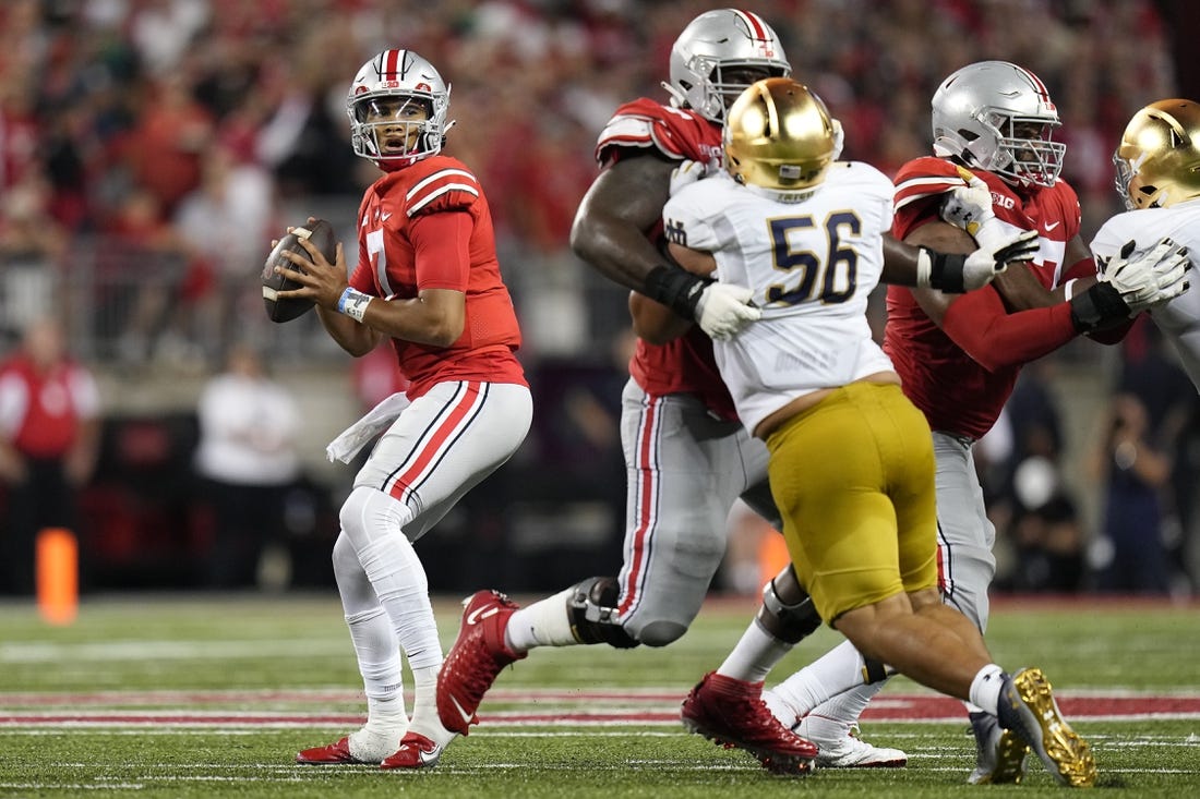 Sep 3, 2022; Columbus, Ohio, USA;  Ohio State Buckeyes quarterback C.J. Stroud (7) drops back to pass during the NCAA football game against the Notre Dame Fighting Irish at Ohio Stadium. Mandatory Credit: Adam Cairns-USA TODAY Sports