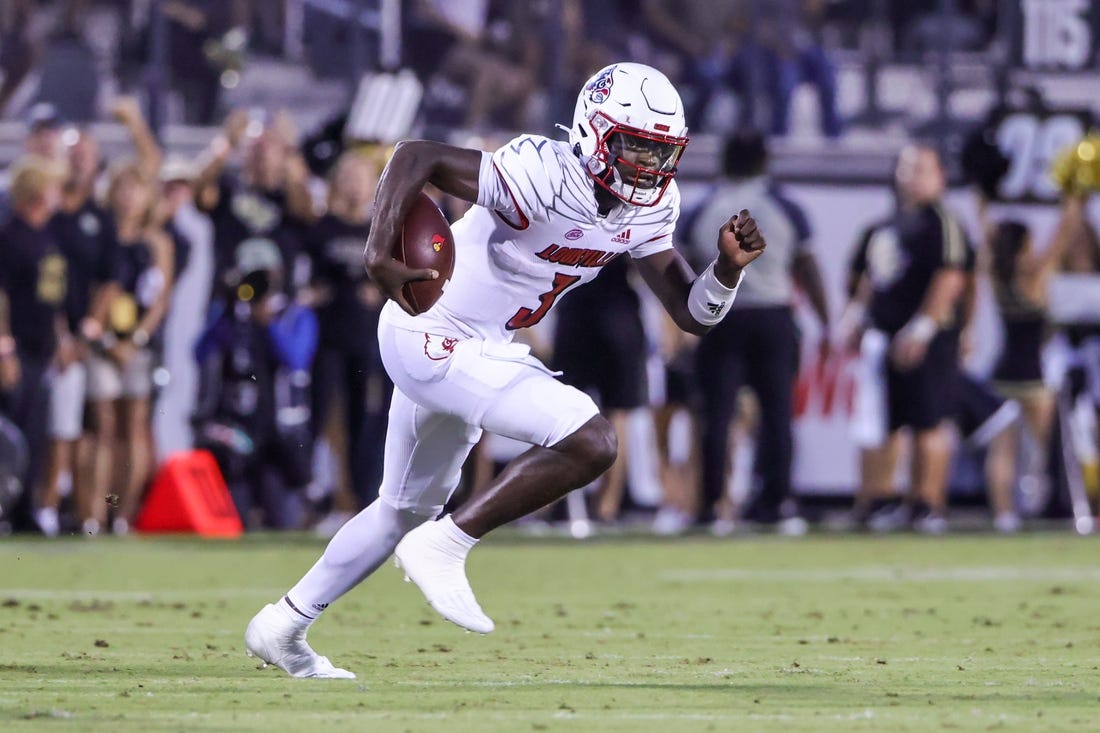 Sep 9, 2022; Orlando, Florida, USA; Louisville Cardinals quarterback Malik Cunningham (3) runs the ball during the first quarter against the UCF Knights at FBC Mortgage Stadium. Mandatory Credit: Mike Watters-USA TODAY Sports