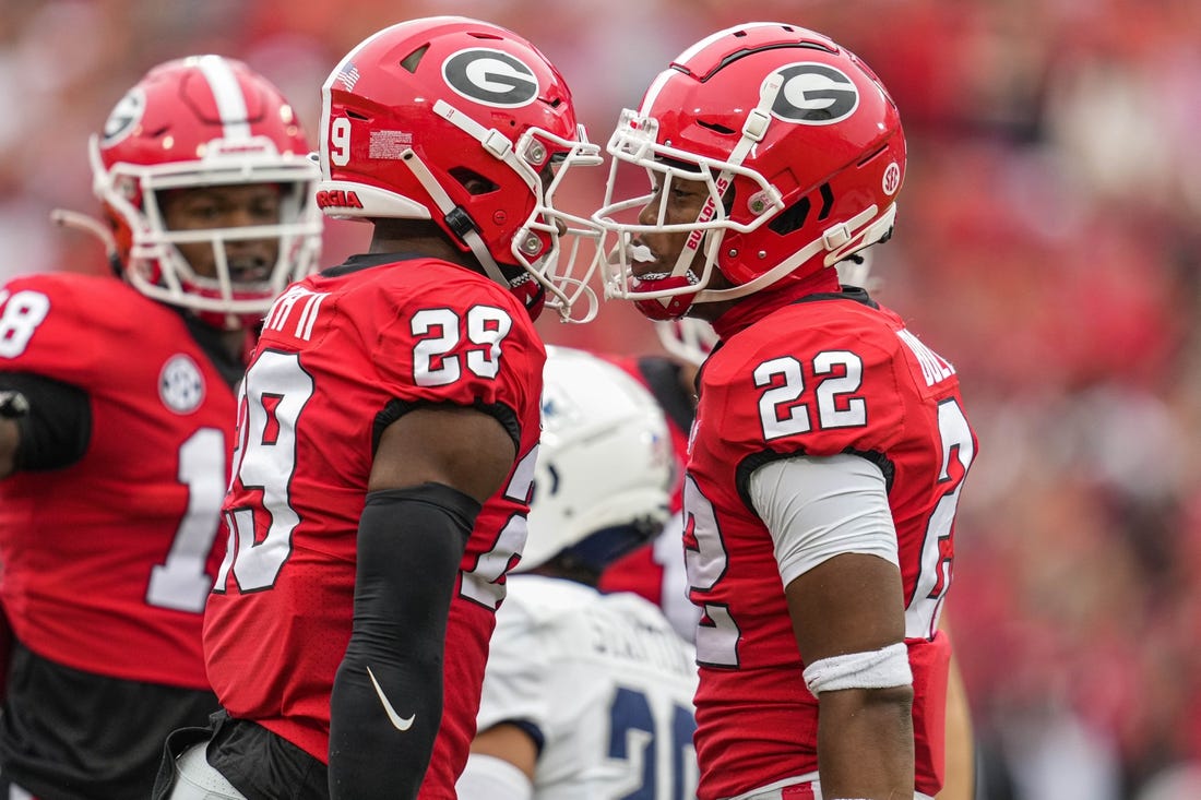 Sep 10, 2022; Athens, Georgia, USA; Georgia Bulldogs defensive back Christopher Smith (29) and defensive back Javon Bullard (22) react after a play against the Samford Bulldogs during the first half at Sanford Stadium. Mandatory Credit: Dale Zanine-USA TODAY Sports