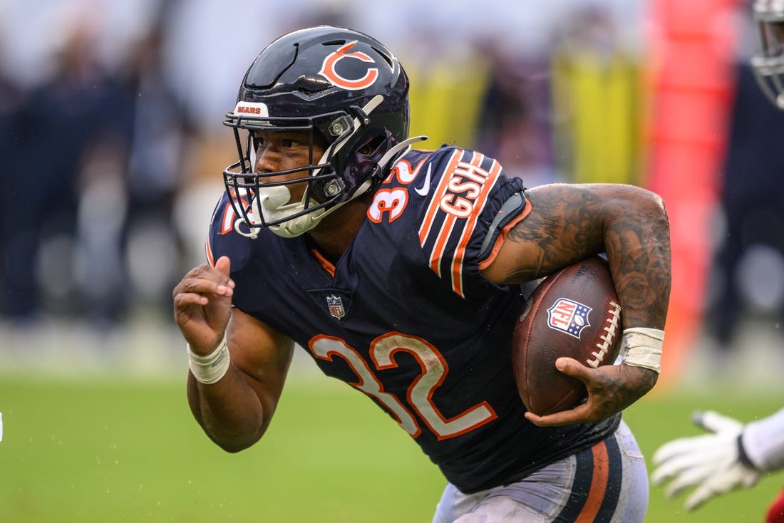 Sep 11, 2022; Chicago, Illinois, USA; Chicago Bears running back David Montgomery (32) runs the ball in the second quarter against the San Francisco 49ers at Soldier Field. Mandatory Credit: Daniel Bartel-USA TODAY Sports
