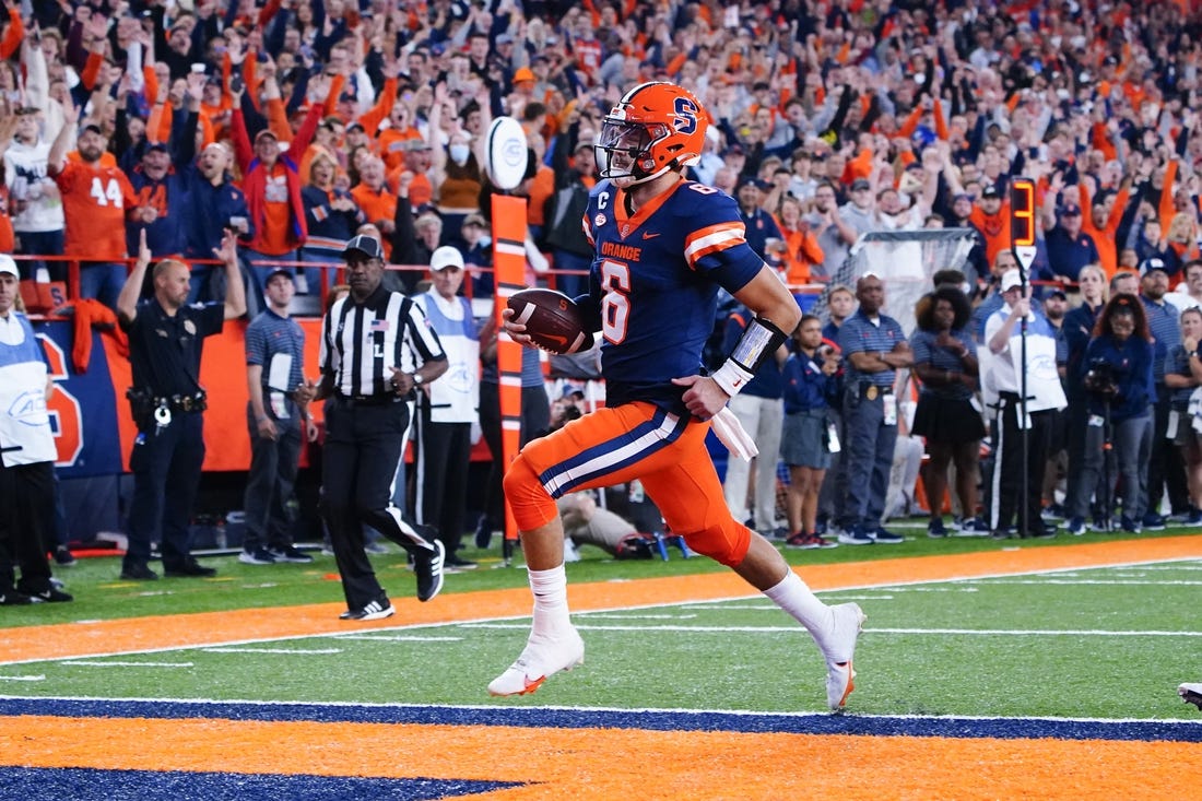 Sep 23, 2022; Syracuse, New York, USA; Syracuse Orange quarterback Garrett Shrader (6) runs with the ball for a touchdown against the Virginia Cavaliers during the first half at JMA Wireless Dome. Mandatory Credit: Gregory Fisher-USA TODAY Sports