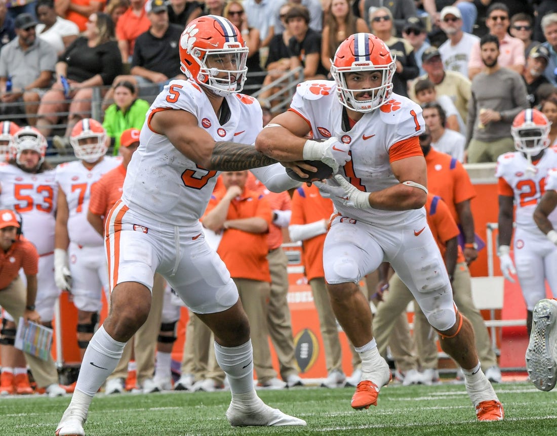 Clemson quarterback D.J. Uiagalelei (5) hands off to running back Will Shipley (1) during the third quarter at Truist Field in Winston-Salem, North Carolina Saturday, September 24, 2022.

Ncaa Football Clemson At Wake Forest