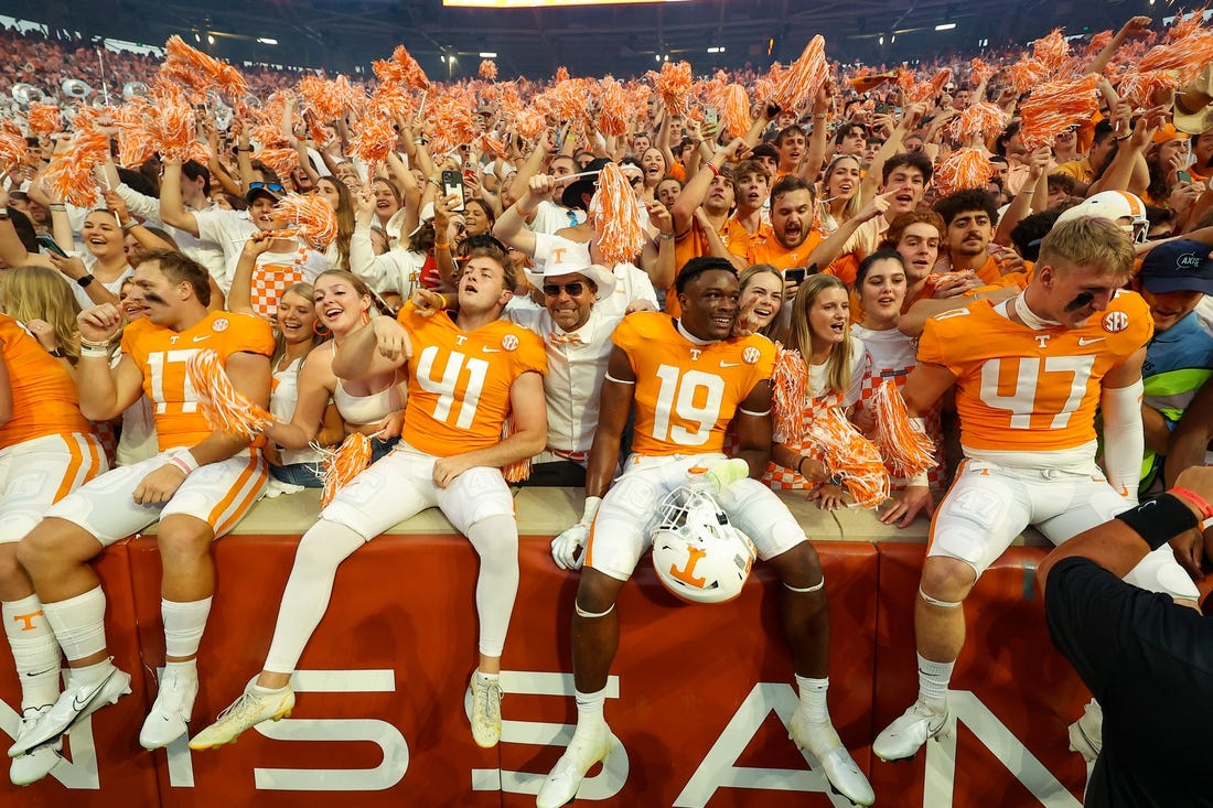 Sep 24, 2022; Knoxville, Tennessee, USA; Tennessee Volunteers players celebrate with fans after the game against the Florida Gators at Neyland Stadium. Mandatory Credit: Randy Sartin-USA TODAY Sports