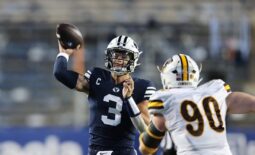Sep 24, 2022; Provo, Utah, USA; Brigham Young Cougars quarterback Jaren Hall (3) passes the ball against Wyoming Cowboys nose tackle Gavin Meyer (90) in the second quarter at LaVell Edwards Stadium. Mandatory Credit: Rob Gray-USA TODAY Sports