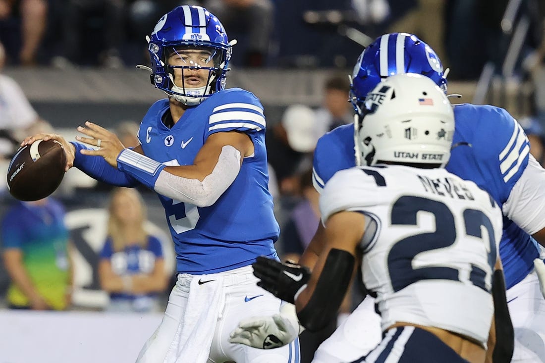 Sep 29, 2022; Provo, Utah, USA;  Brigham Young Cougars quarterback Jaren Hall (3) drops back to pass in the second quarter against the Utah State Aggies at LaVell Edwards Stadium. Mandatory Credit: Rob Gray-USA TODAY Sports