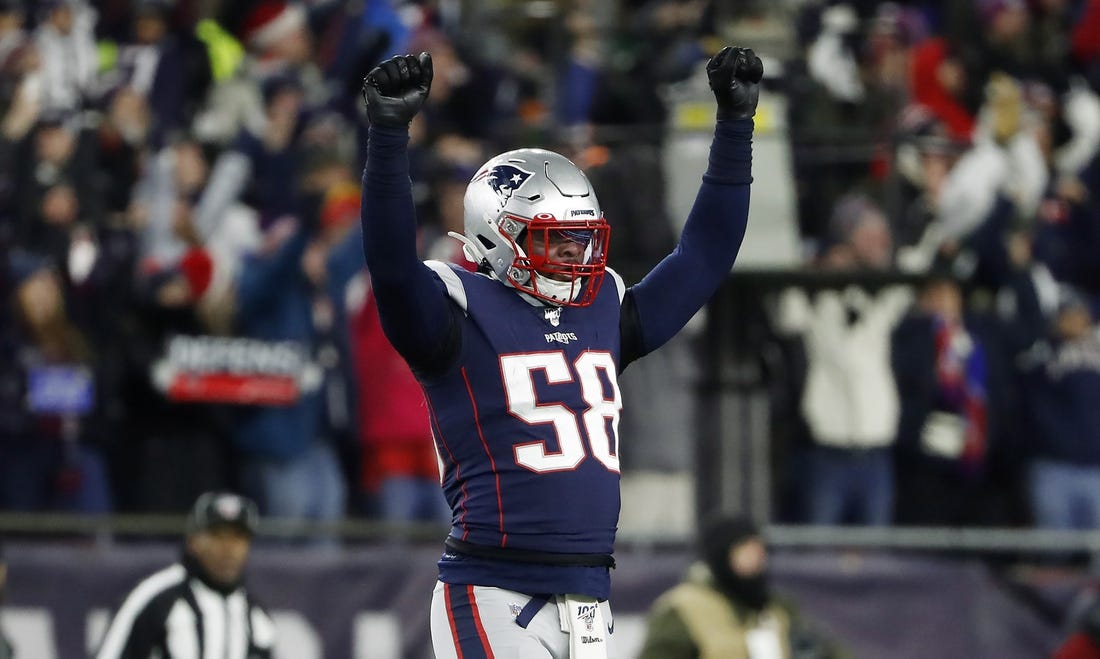 Dec 21, 2019; Foxborough, Massachusetts, USA; New England Patriots outside linebacker Jamie Collins (58) celebrates after Buffalo couldn't convert on a fourth down late in the fourth quarter of their win over the Buffalo Bills at Gillette Stadium. Mandatory Credit: Winslow Townson-USA TODAY Sports