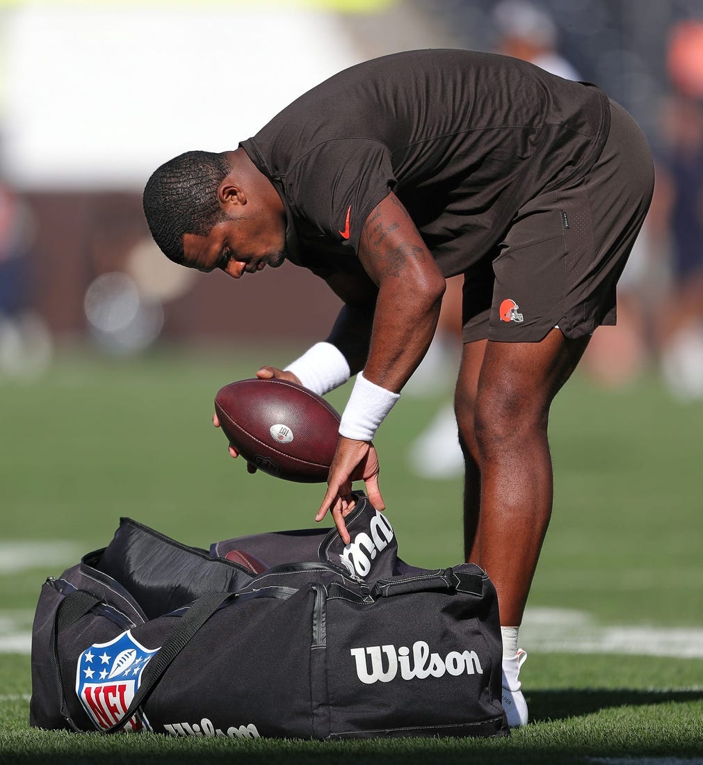 Cleveland Browns quarterback Deshaun Watson checks the balls before an NFL preseason football game against the Chicago Bears, Saturday, Aug. 27, 2022, in Cleveland, Ohio.

Brownspre 2