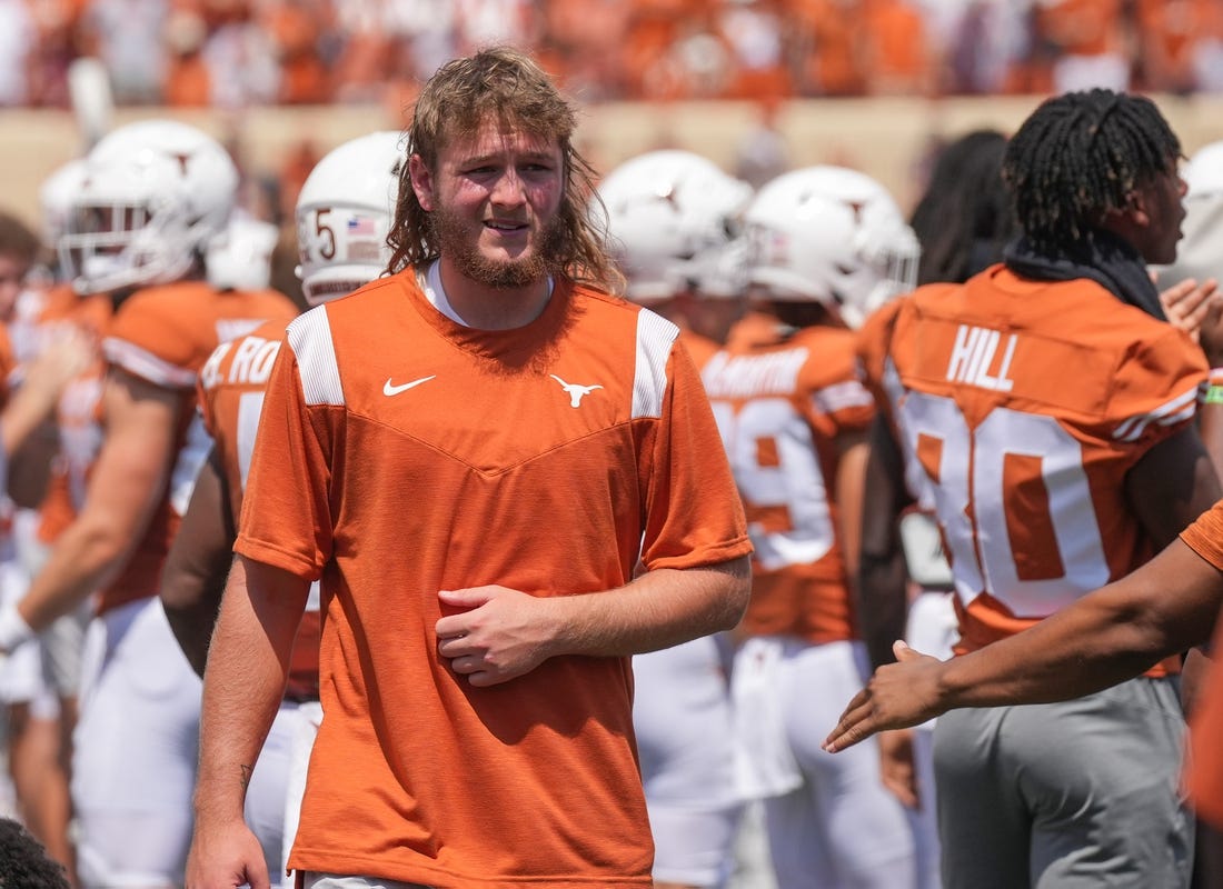Sep 10, 2022; Austin, TX, USA; Texas quarterback Quinn Ewers walks to the medical tent during the fourth quarter of the loss to Alabama at Darrell K Royal   Texas Memorial Stadium on Saturday September 10, 2022.   Mandatory Credit: Jay Janner/Austin American-Statesman-USA TODAY NETWORK