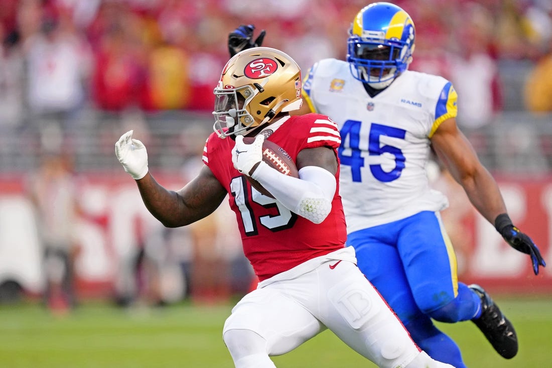 Oct 3, 2022; Santa Clara, California, USA; San Francisco 49ers wide receiver Deebo Samuel (19) runs with the ball against the Los Angeles Rams during the second quarter at Levi's Stadium. Mandatory Credit: Kyle Terada-USA TODAY Sports