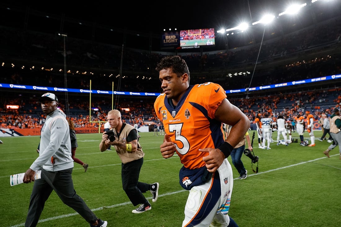 Oct 6, 2022; Denver, Colorado, USA; Denver Broncos quarterback Russell Wilson (3) runs off the field after the game against the Indianapolis Colts at Empower Field at Mile High. Mandatory Credit: Isaiah J. Downing-USA TODAY Sports