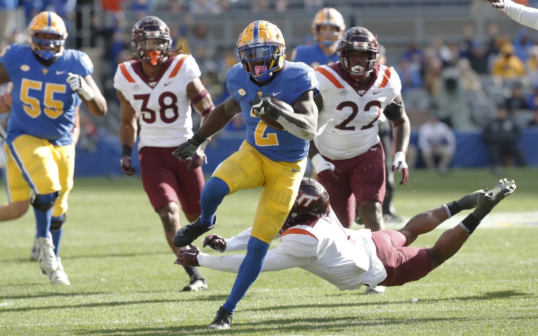 Oct 8, 2022; Pittsburgh, Pennsylvania, USA;  Pittsburgh Panthers running back Israel Abanikanda (2) runs to score a touchdown against the Virginia Tech Hokies during the first quarter at Acrisure Stadium. Mandatory Credit: Charles LeClaire-USA TODAY Sports
