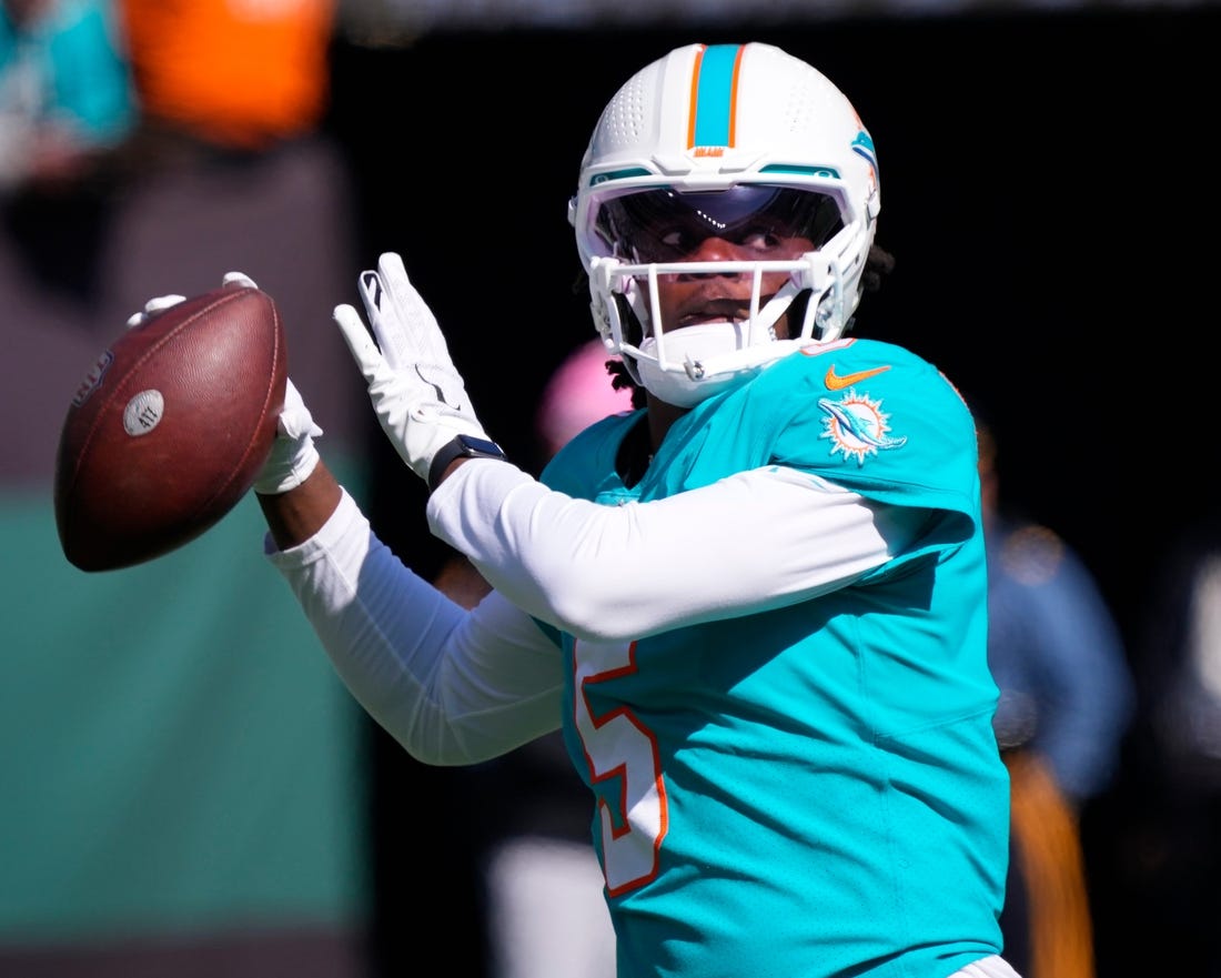 Oct 9, 2022; East Rutherford, New Jersey, USA; Miami Dolphins quarterback Teddy Bridgewater (5) warms up before the game against the New York Jets at MetLife Stadium. Mandatory Credit: Robert Deutsch-USA TODAY Sports