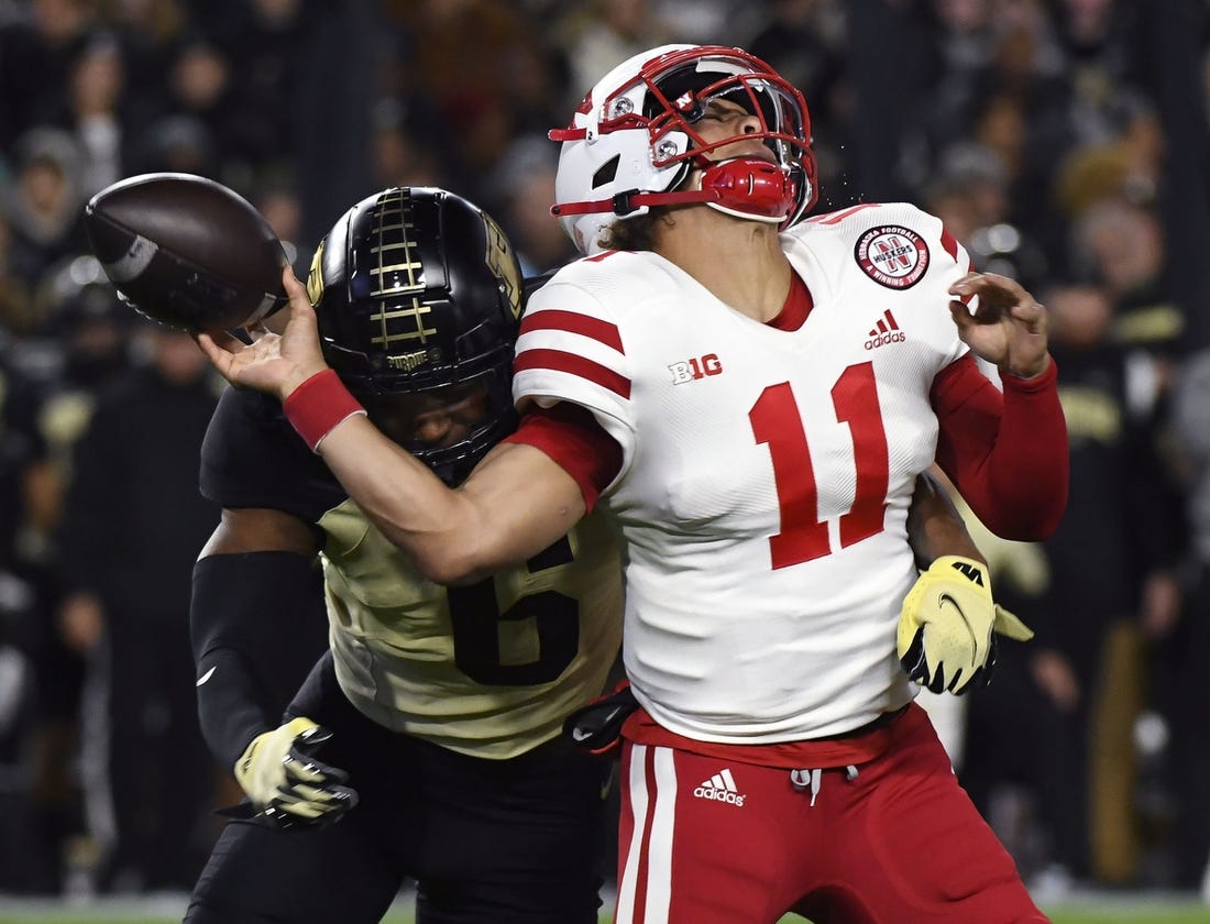 Oct 15, 2022; West Lafayette, Indiana, USA; Purdue Boilermakers linebacker Jalen Graham (6) forces a fumble from Nebraska Cornhuskers quarterback Casey Thompson (11) during the first half at Ross-Ade Stadium. Mandatory Credit: Robert Goddin-USA TODAY Sports