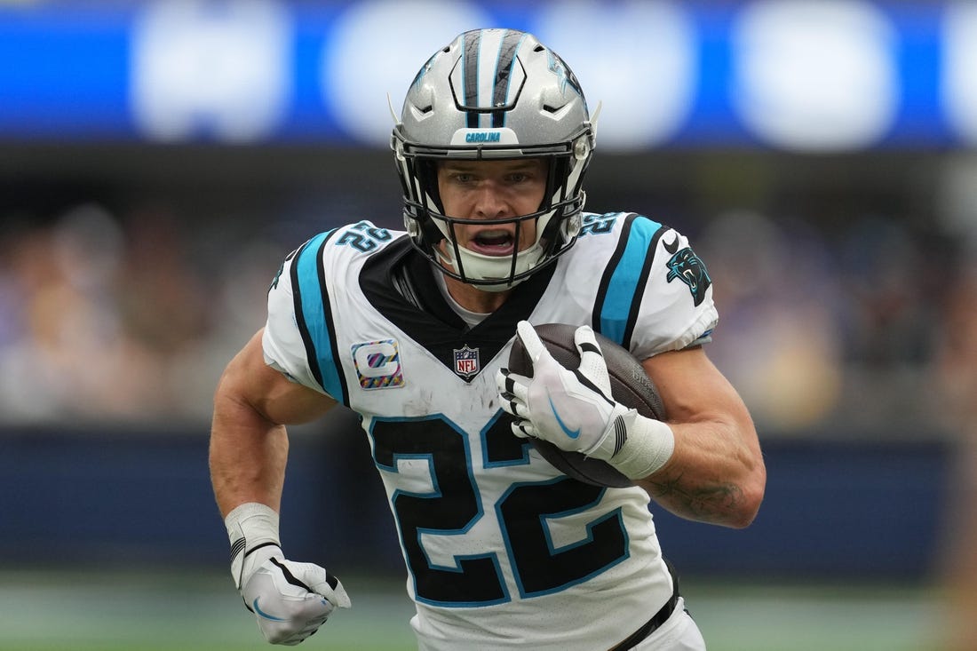 Oct 16, 2022; Inglewood, California, USA; Carolina Panthers running back Christian McCaffrey (22) carries the ball against the Los Angeles Rams in the first half at SoFi Stadium. Mandatory Credit: Kirby Lee-USA TODAY Sports