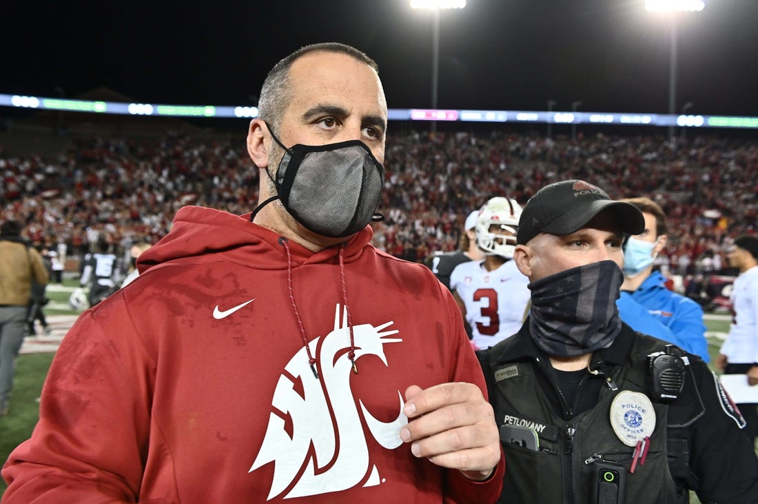 Oct 16, 2021; Pullman, Washington, USA; Washington State Cougars head coach Nick Rolovich celebrates after a game against the Stanford Cardinal at Gesa Field at Martin Stadium. The Cougars won 34-31. Mandatory Credit: James Snook-USA TODAY Sports