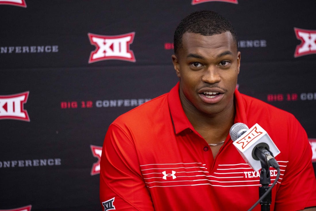 Jul 14, 2022; Arlington, TX, USA; Texas Tech Red Raiders outside linebacker Tyree Wilson is interviewed during the Big 12 Media Day at AT&T Stadium. Mandatory Credit: Jerome Miron-USA TODAY Sports