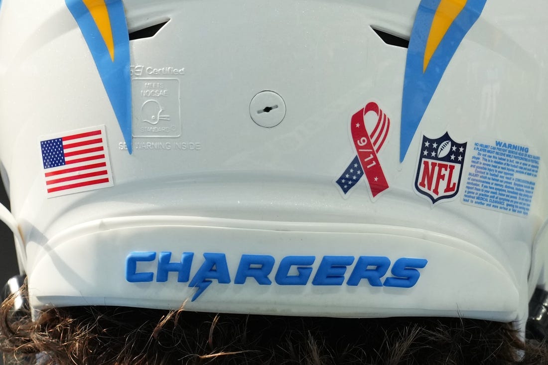 Sep 11, 2022; Inglewood, California, USA; A detailed view of the 9/11 ribbon logo on the back of the helmet of Los Angeles Chargers quarterback Justin Herbert (10) during the game against the Las Vegas Raiders at SoFi Stadium. Mandatory Credit: Kirby Lee-USA TODAY Sports