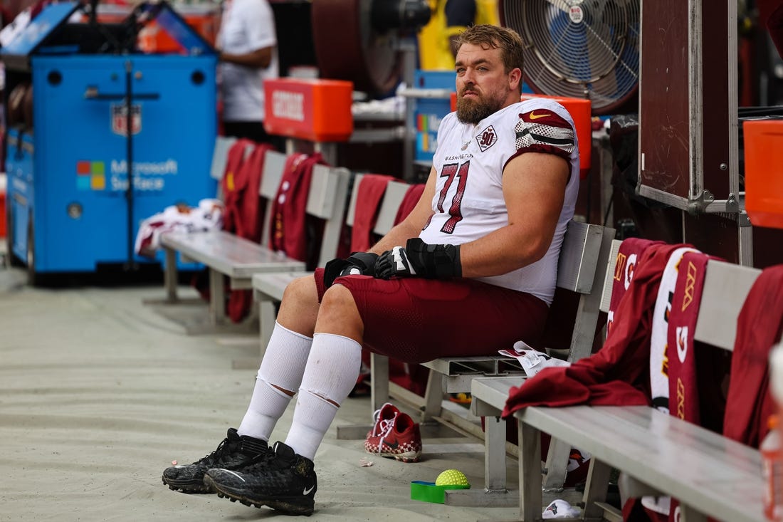 Sep 11, 2022; Landover, Maryland, USA; Washington Commanders guard Wes Schweitzer (71) looks on from the sidelines during the second half of the game against the Jacksonville Jaguars at FedExField. Mandatory Credit: Scott Taetsch-USA TODAY Sports
